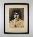 Image of Untitled [woman with dark hair and oval necklace]